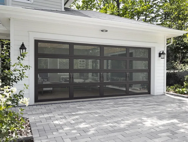 Garden Grove Garage Door Repair design specialist presenting custom garage door options to Garden Grove homeowner