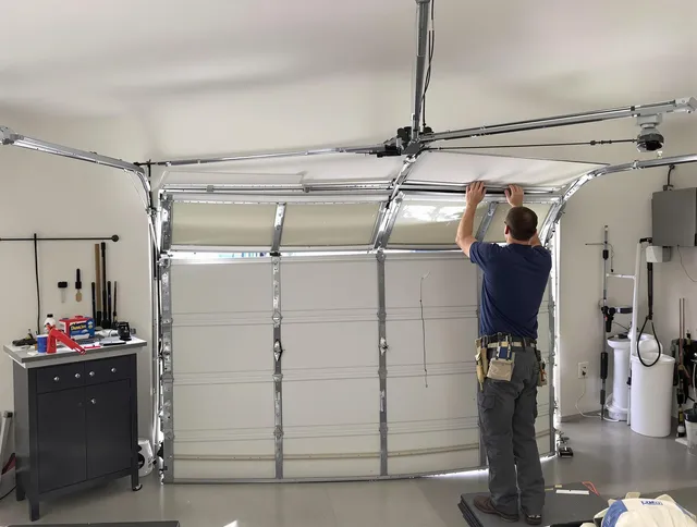 Garden Grove Garage Door Repair specialist performing precise section replacement on Garden Grove garage door