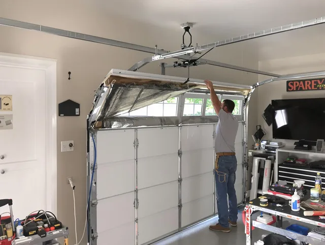 Garage door section replacement by Garden Grove Garage Door Repair in Garden Grove