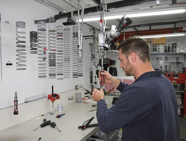 Garden Grove Garage Door Repair safety certified technician performing precision spring replacement in Garden Grove